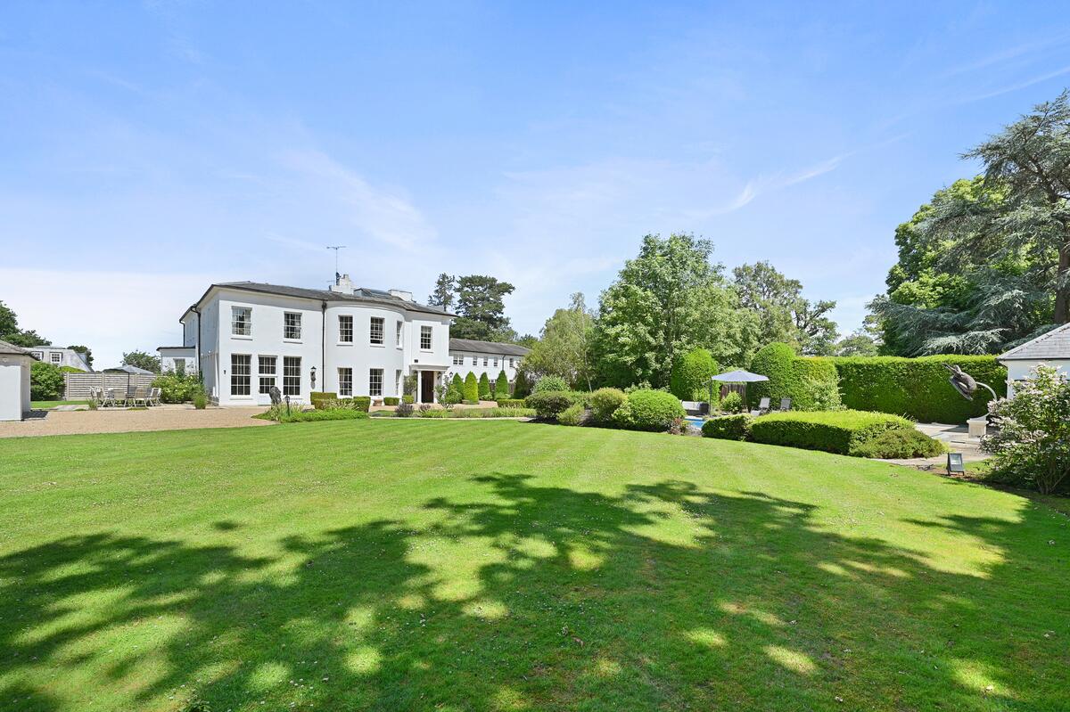 The house from the lawn, with tree shadows